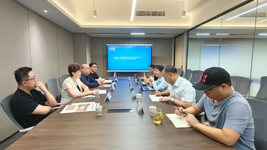 人民日报《中国城市报》舆情中心到访文投榕树洽谈合作(图1)